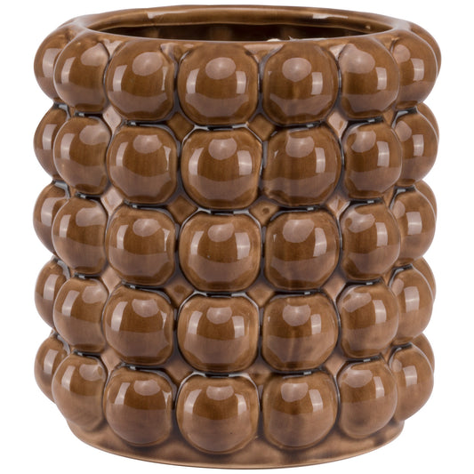 Handcrafted ceramic planter with a rich caramel glaze and bubble texture, perfect for elegant indoor displays.