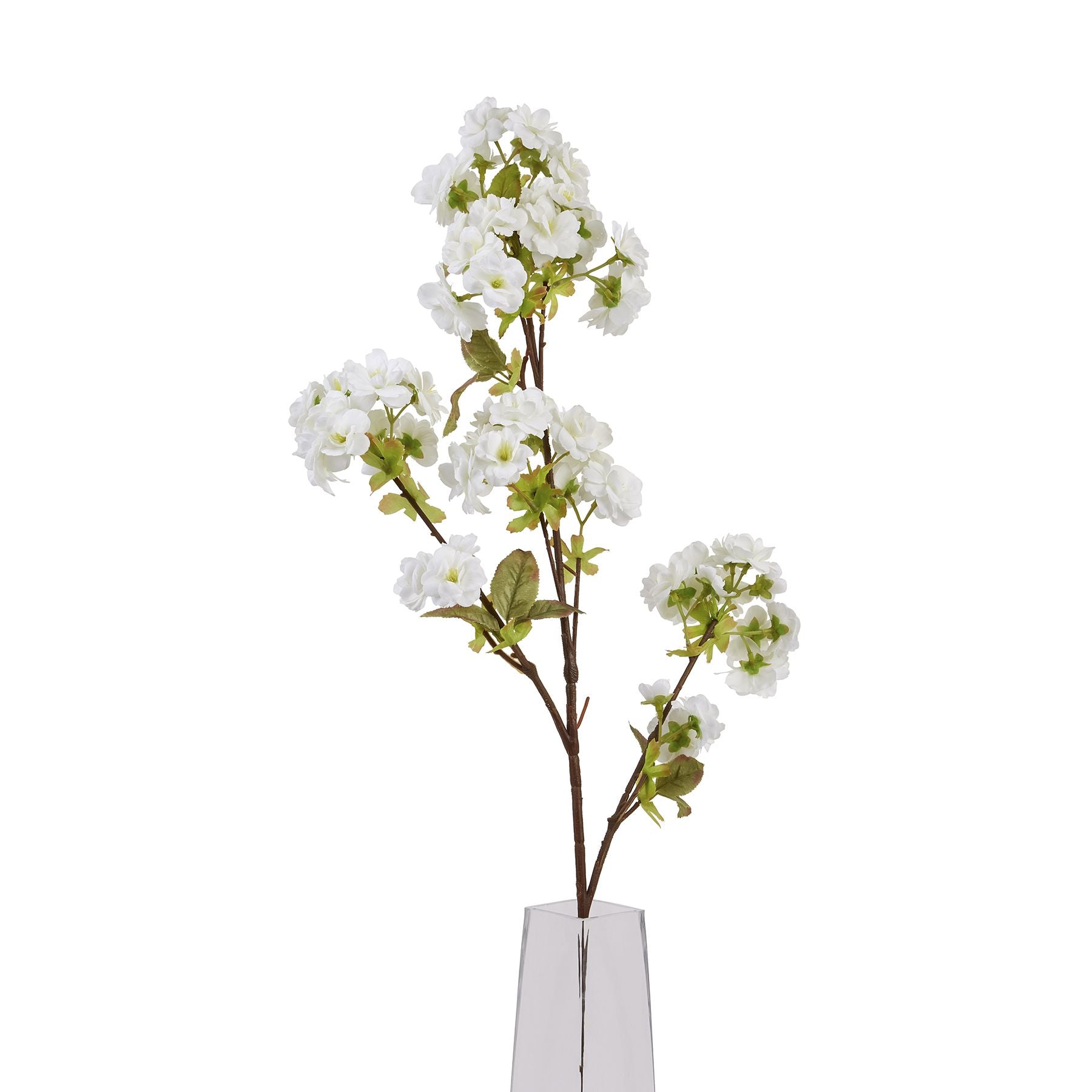Tall 130cm white artificial blossom stem with lush green leaves in a clear vase, adding elegance to any decor.