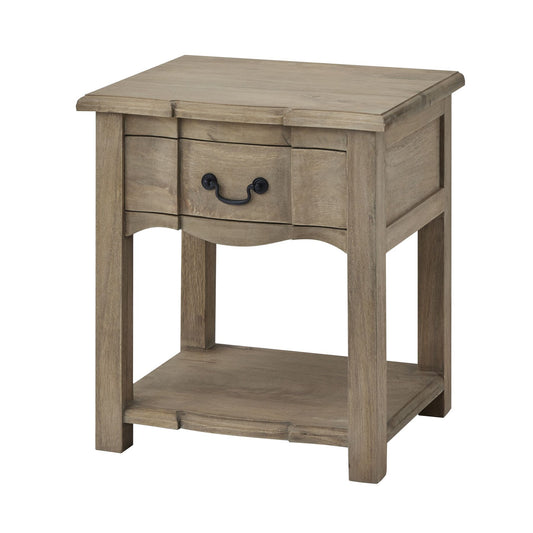 Rustic side table with a washed, bleached hardwood finish, featuring a full-width drawer and shelf, accented by black iron handles.