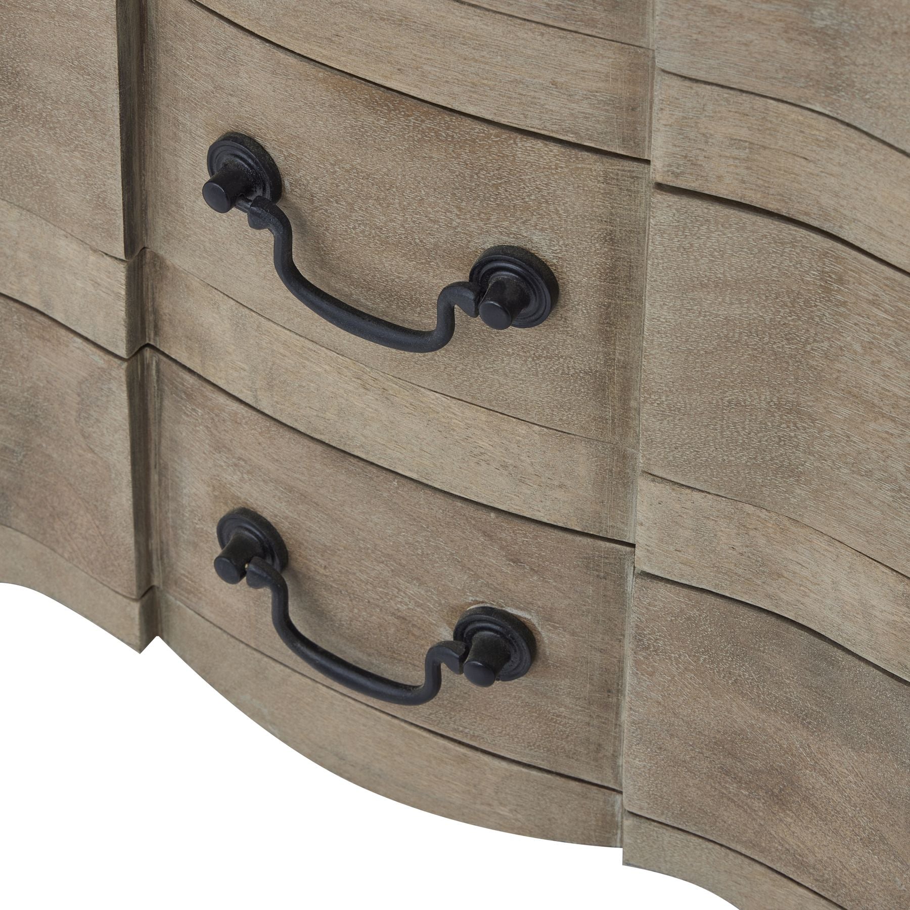 Elegant wooden bedside table with three drawers, featuring black iron handles and a washed, bleached finish.