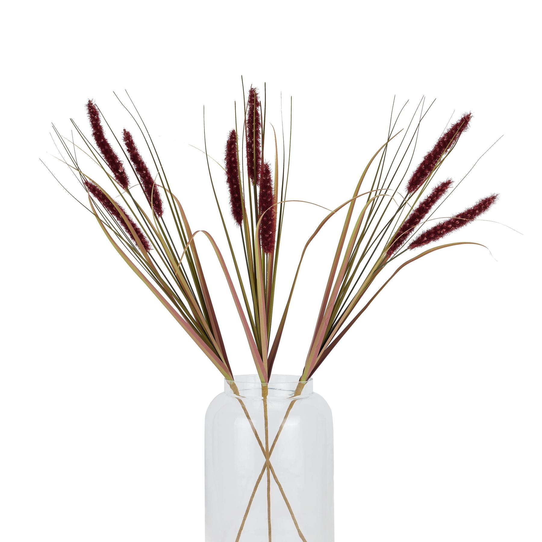 Rich ruby-colored artificial grass stems in a clear vase, showcasing a luxurious, textured appearance for elegant decor.