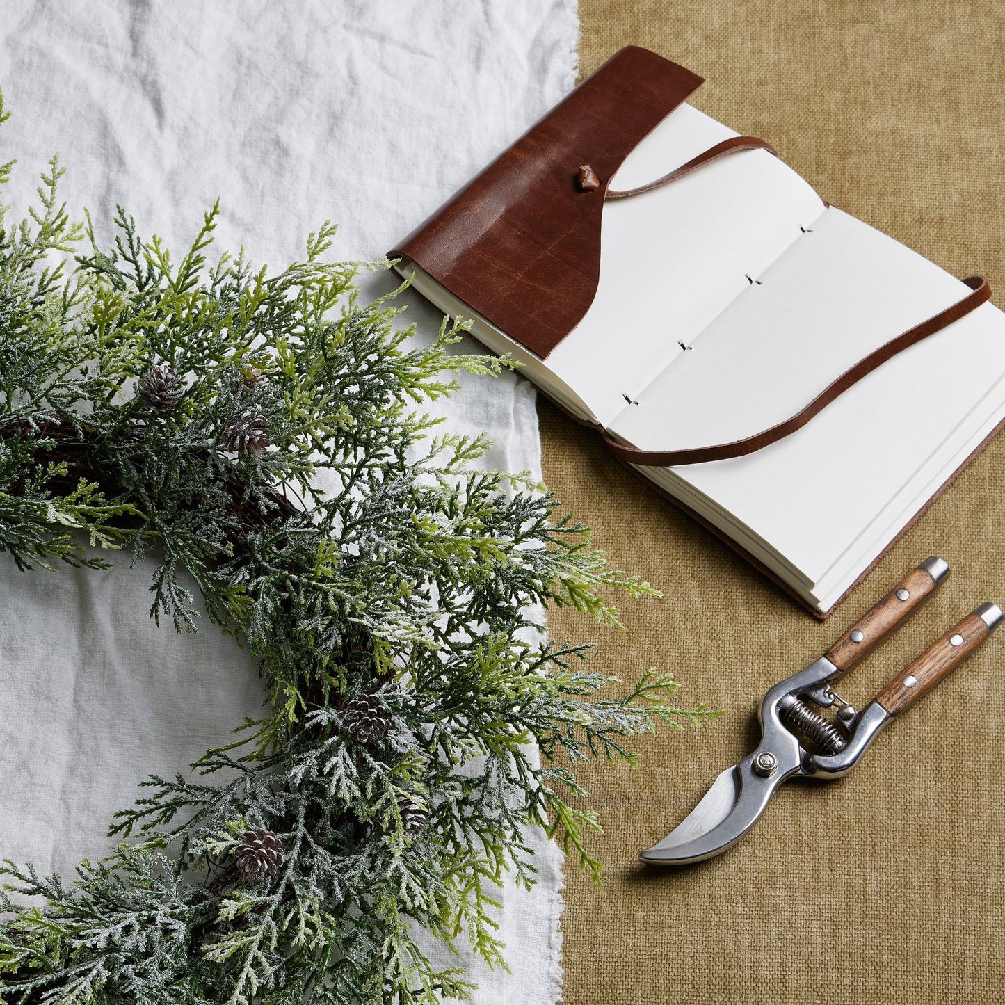 Frosted Pine Wreath With Pinecones - Christmas Wreaths & Garlands from the Quanta Home collection.