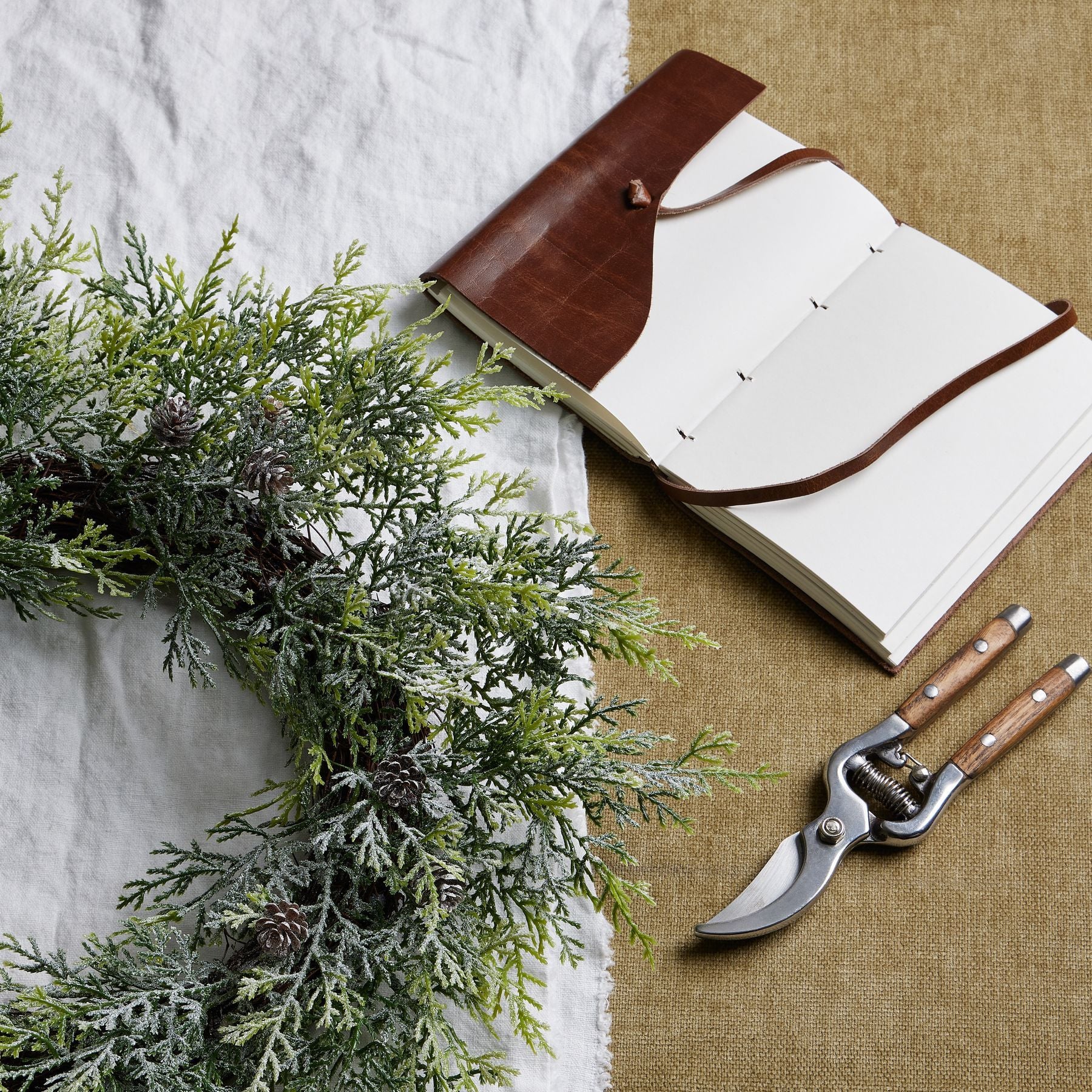 Frosted Pine Wreath With Pinecones - Christmas Wreaths & Garlands from the Quanta Home collection.