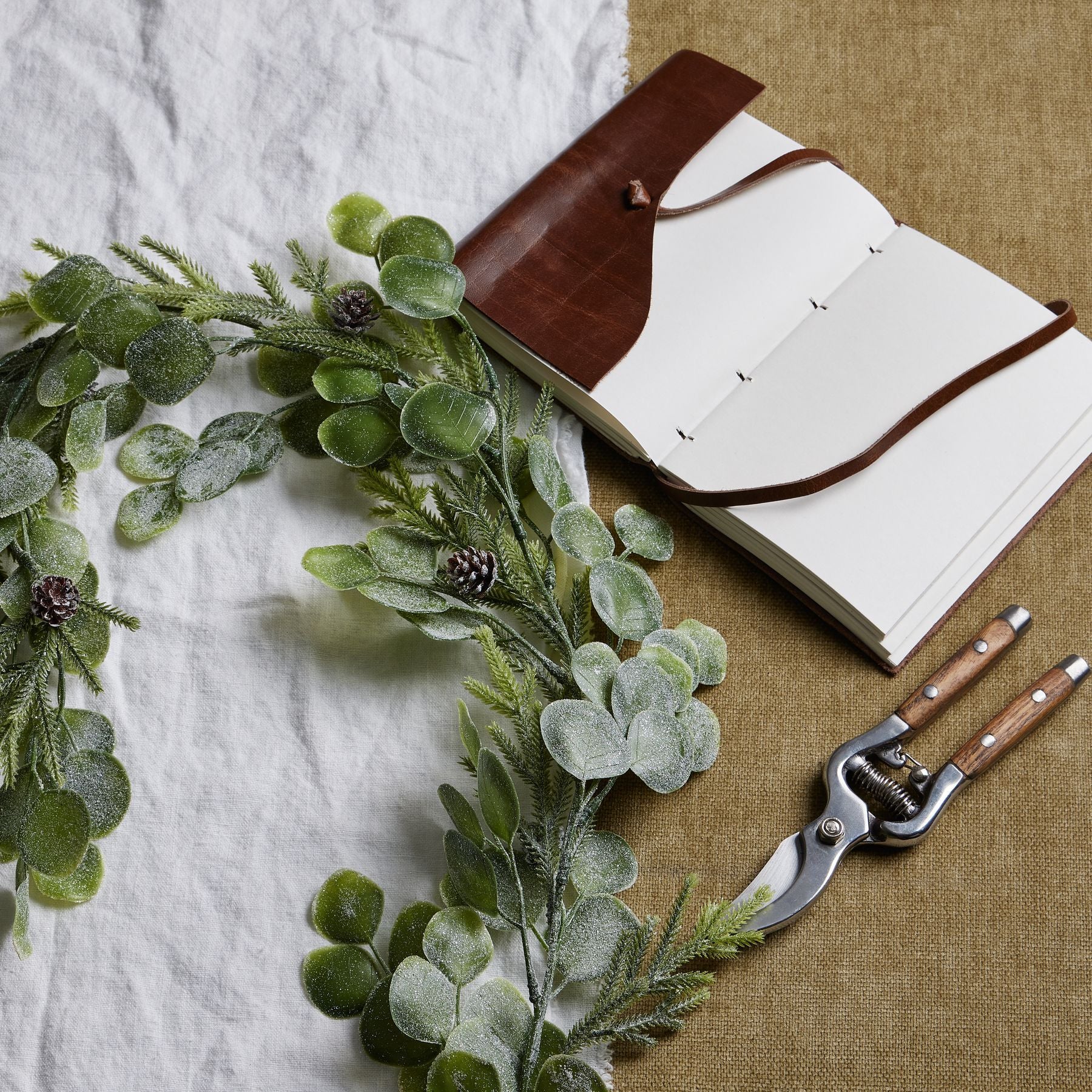 Frosted Pine And Eucalyptus Garland - Christmas Wreaths & Garlands from the Quanta Home collection.