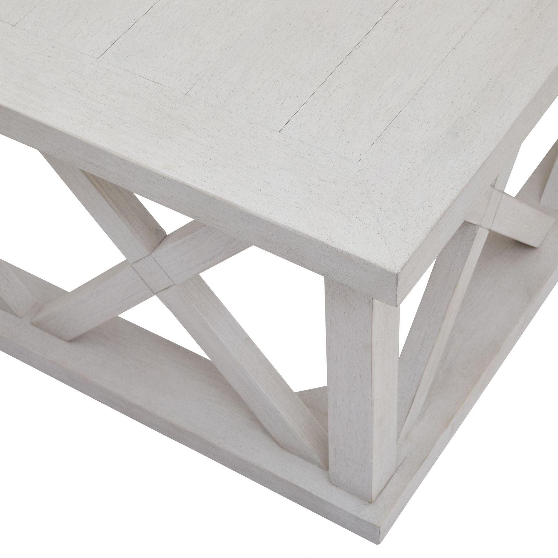Square coffee table in weathered white pine, featuring a distinctive lattice design and smooth wooden surface, blending rustic and modern styles.