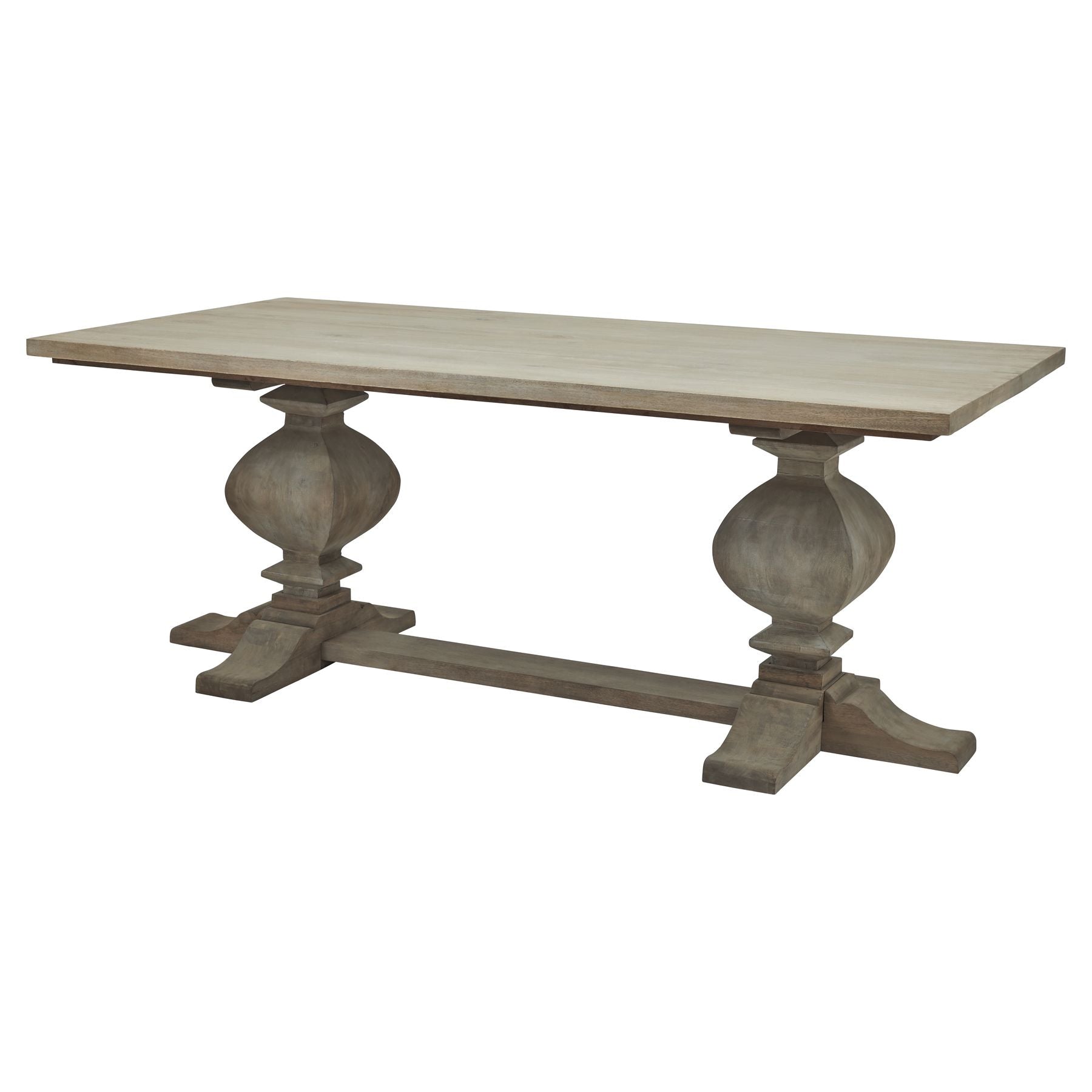Large dining table in washed, bleached hardwood with black iron accents; features elegant, sculptural legs inspired by French design.