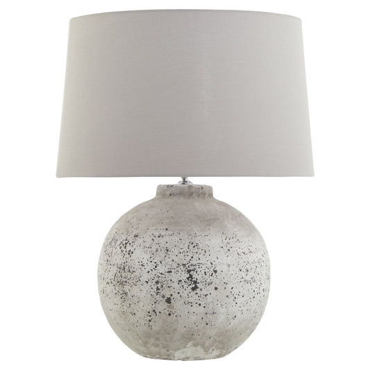 Rustic stone ceramic lamp with a textured speckled base and elegant grey shade, perfect for cozy living spaces.