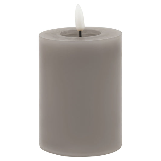 Grey LED wax candle with a realistic melt-effect and flickering flame, offering safe, elegant ambient lighting for any space.