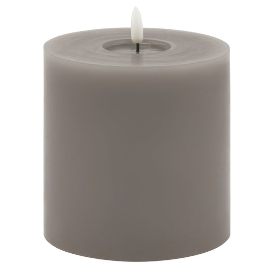 Grey LED wax candle featuring a realistic melt effect and a warm flicker-free glow, adding elegance to any decor.