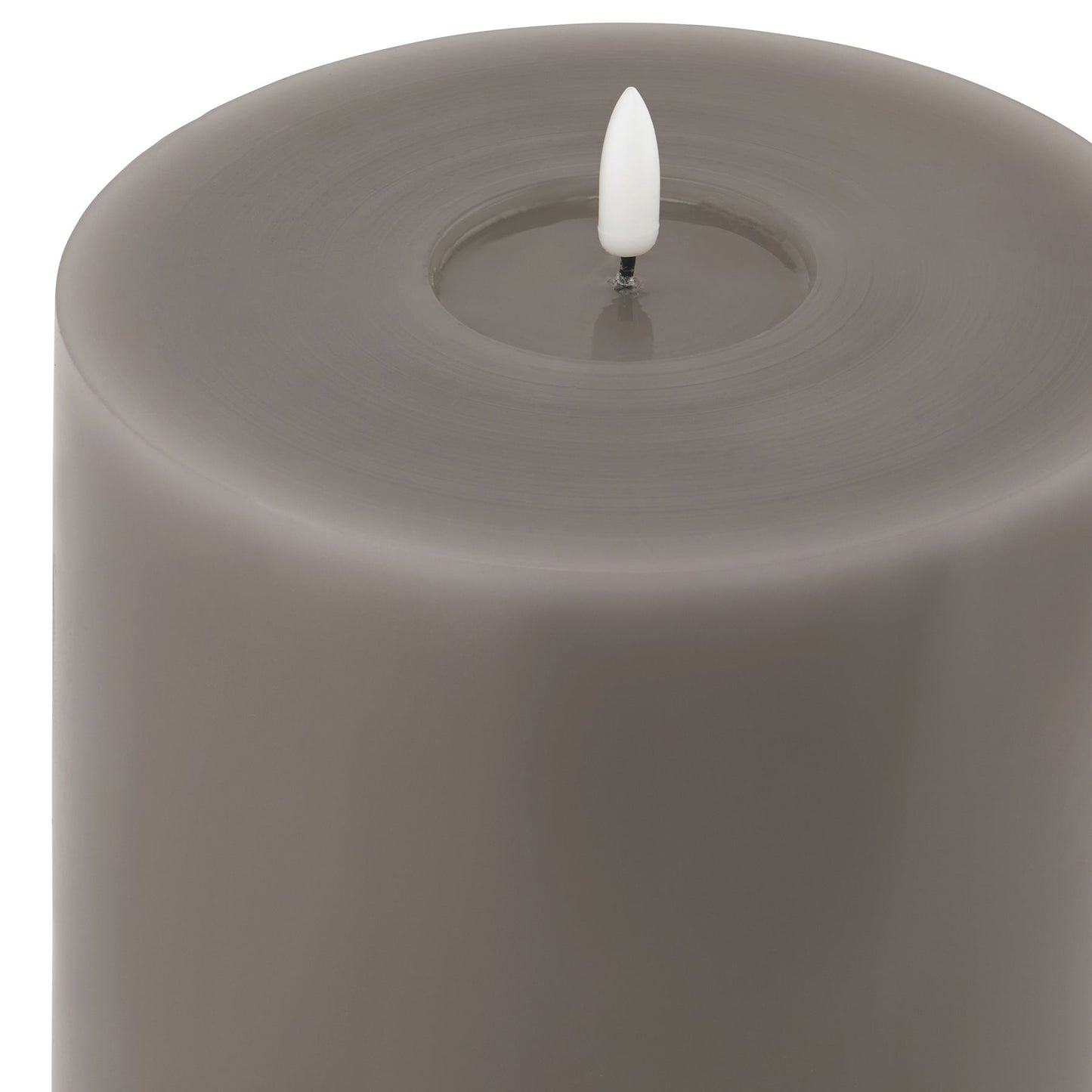Grey LED wax candle with an authentic dripping effect and a white flame tip, creating a warm, inviting glow.