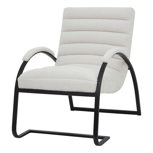 Boucle ribbed chair featuring a soft cream upholstery and curved black metal frame, blending elegance with comfort.