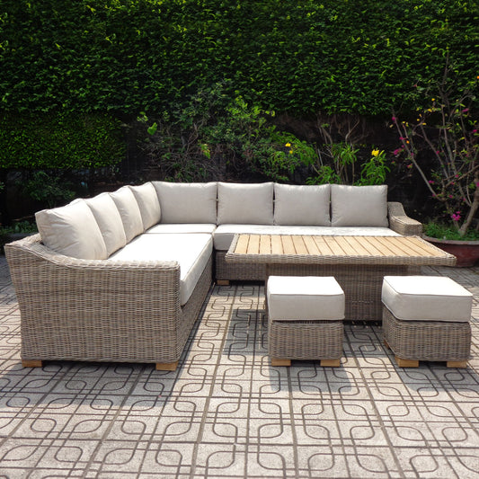 Elegant outdoor corner set in neutral tones, featuring cushioned seating, a wooden riser table, and two matching stools.