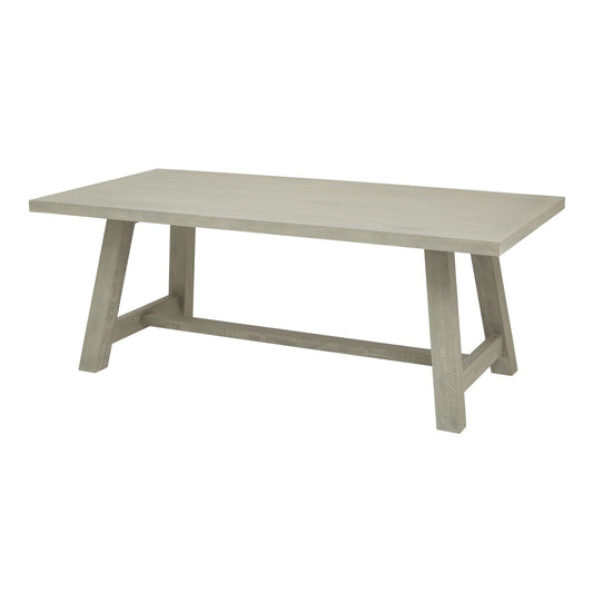 Rectangular dining table with a weathered wood finish, featuring soft, curved edges and sleek legs for a modern, elegant look.