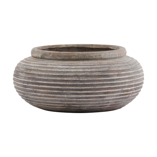 Brown round ribbed planter with a weathered finish, featuring horizontal ribbing for added texture, perfect for large plants.