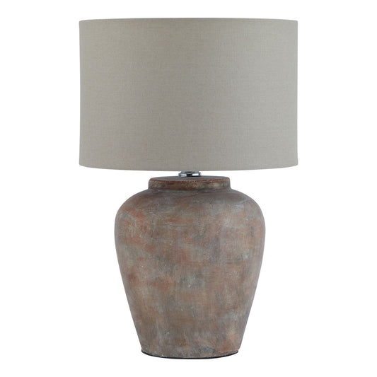 Siena brown table lamp featuring a textured ceramic base and a soft beige linen shade, adding elegant warmth to any space.