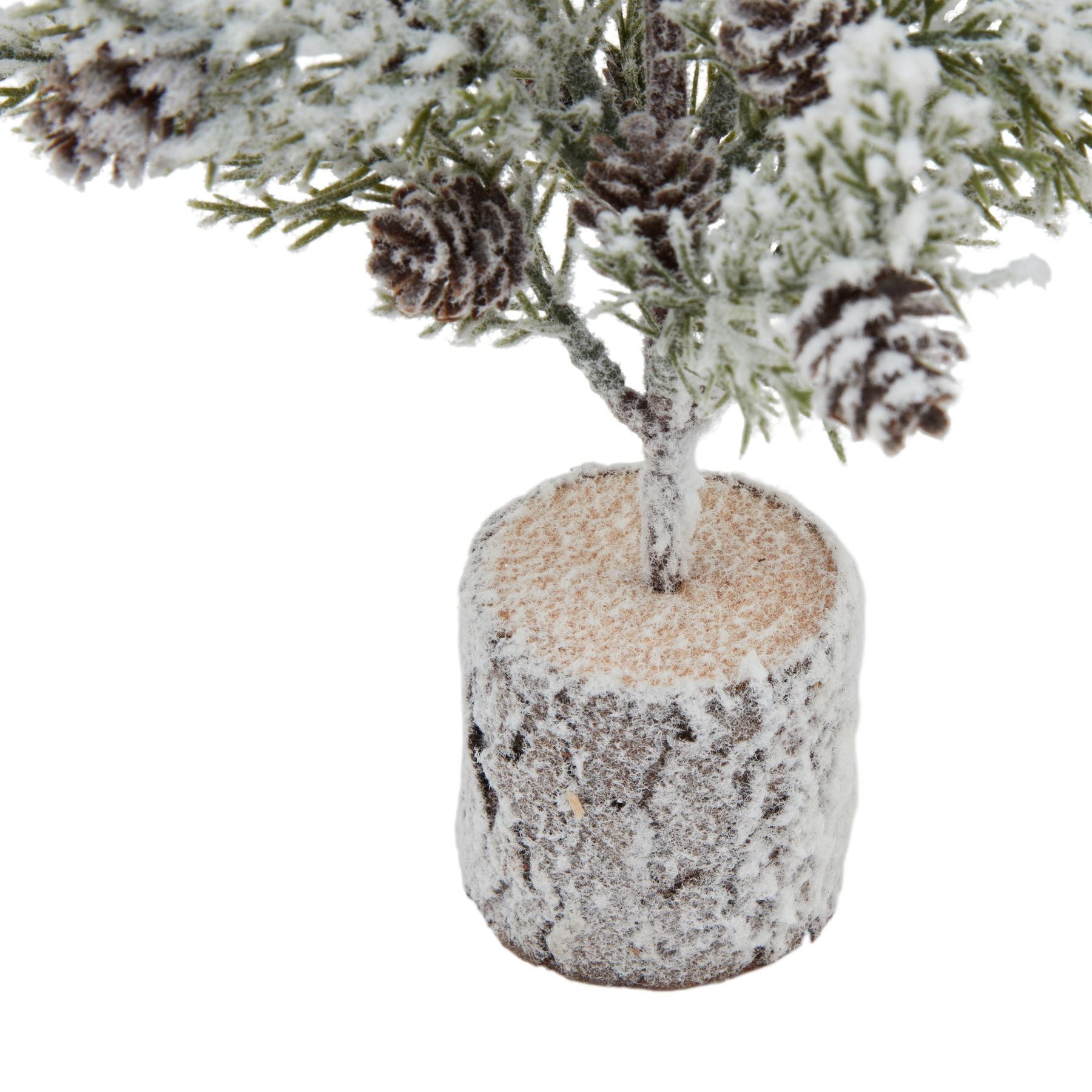 Small Snowy Fir Tree With Pinecones In Wood Log - Christmas Room Decorations from the Quanta Home collection.