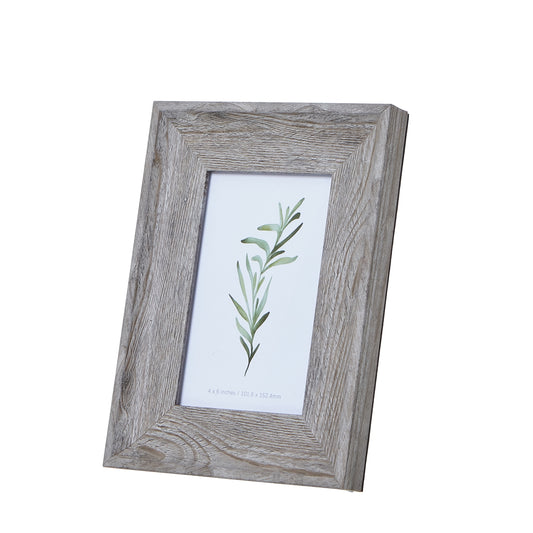 Grey washed 4x6 photo frame with a rustic weathered finish, showcasing a delicate botanical print in soft green tones.
