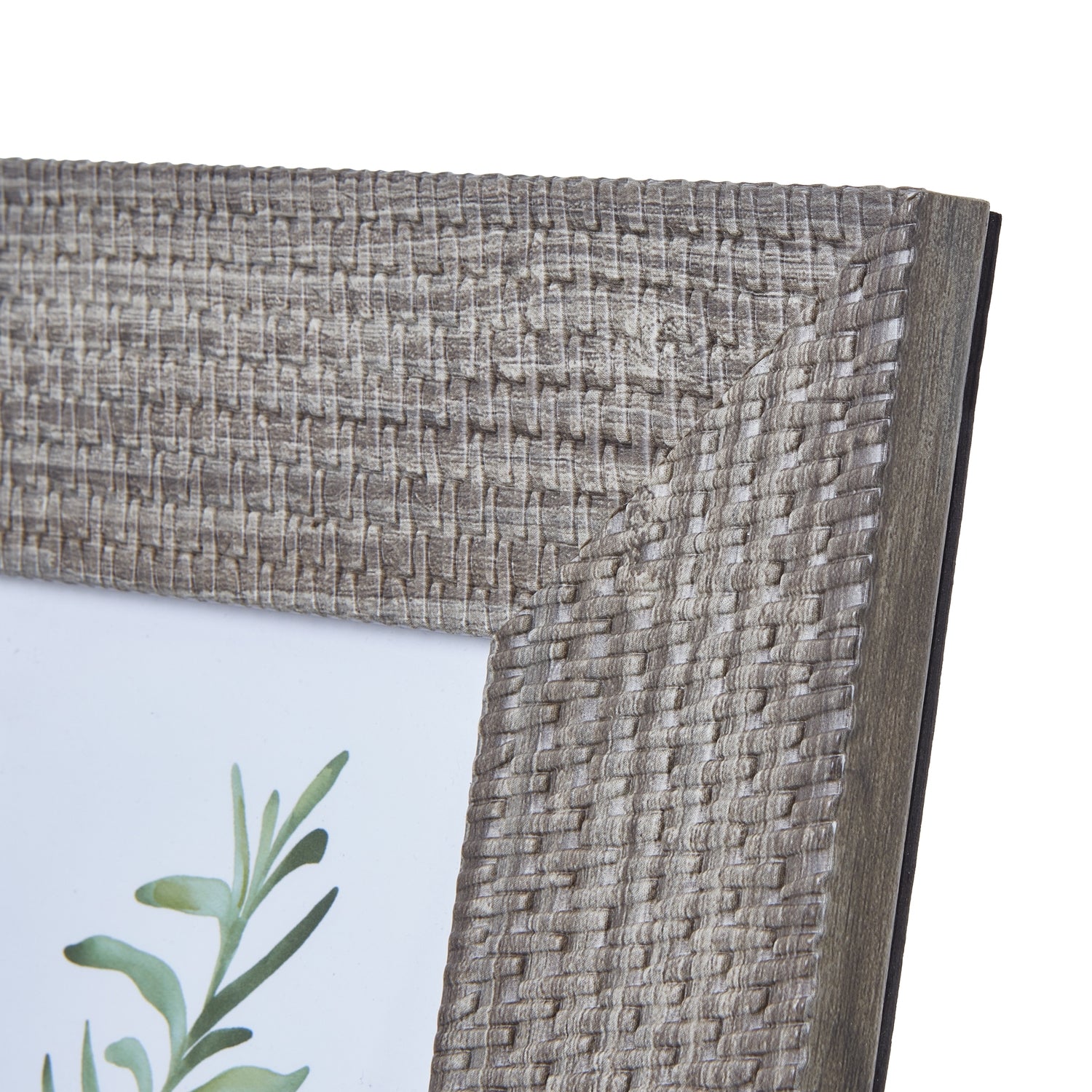 Grey-washed woven photo frame with intricate pattern, designed for 4x6 photos, perfect for elegant home decor.