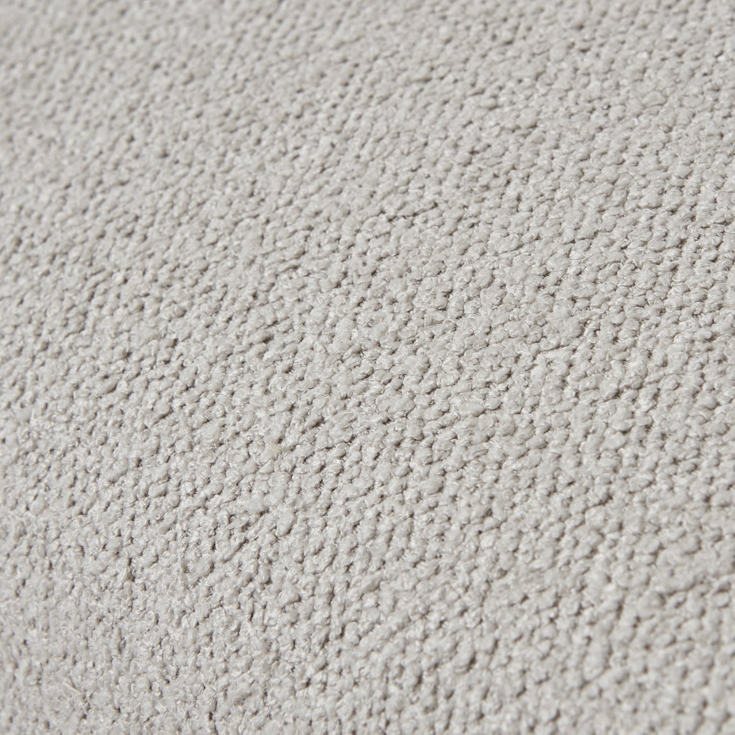 Plush, neutral-toned twill upholstery with a textured surface, perfect for elegant dining environments.