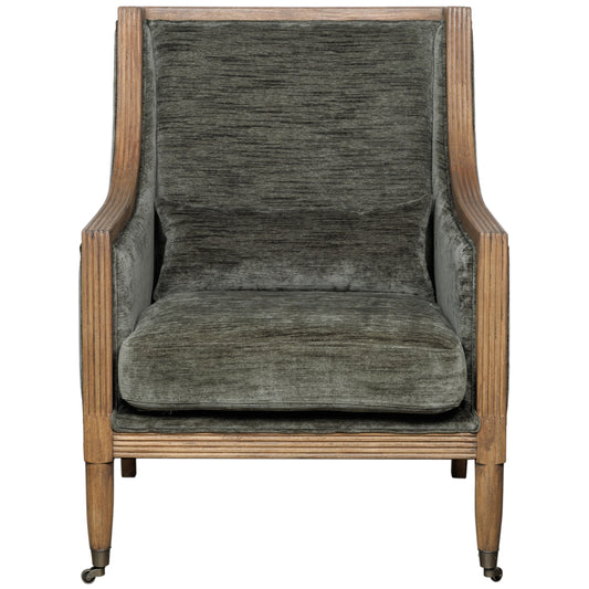 Olive velvet armchair with a curved silhouette and wooden frame, exuding elegance and sophistication for any space.