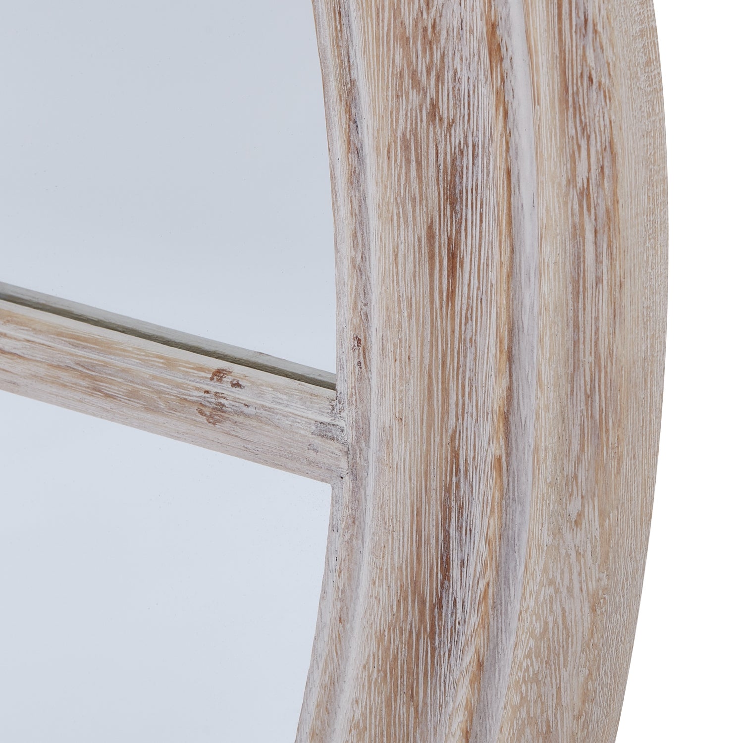Round mirror featuring a washed wood frame with a weathered finish, exuding rustic elegance and artisanal charm.