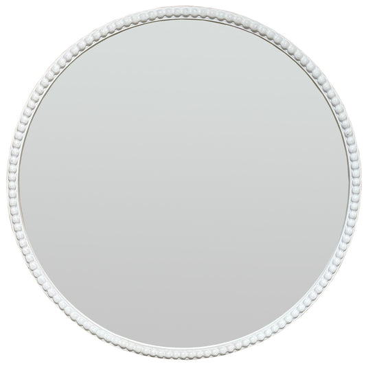 Round mirror with a distressed washed wood frame, featuring intricate beaded detailing, enhancing elegance and light.