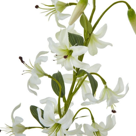 Delicate white bell-shaped flowers with rich green foliage create a lush, elegant look in this Turks Cap Green Lily Spray.