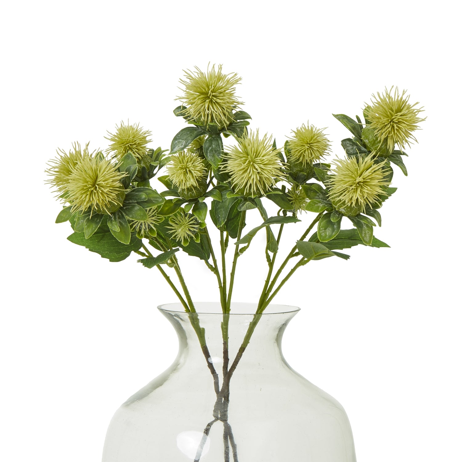 Lifelike green safflower spray with striking yellow petals and lush foliage, arranged elegantly in a clear vase.