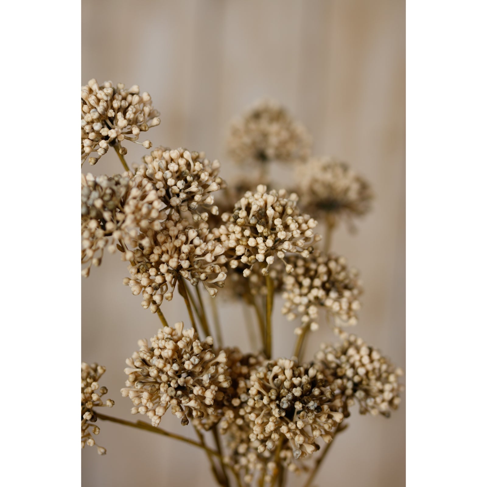 Artificial brown allium spray featuring intricately crafted spherical blooms, enhancing interiors with warm, earthy tones.