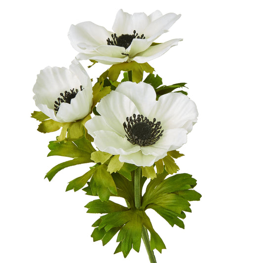 White anemone spray featuring delicate petals, lush green leaves, and black centers, perfect for elegant home decor.