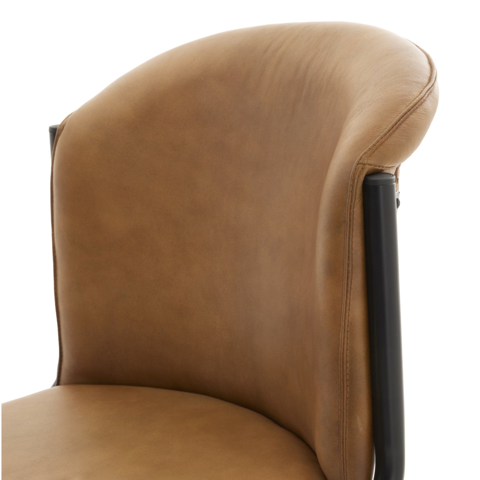 Curved dining chair featuring soft, tan full-grain leather upholstery and a sturdy black metal frame for elegant comfort.