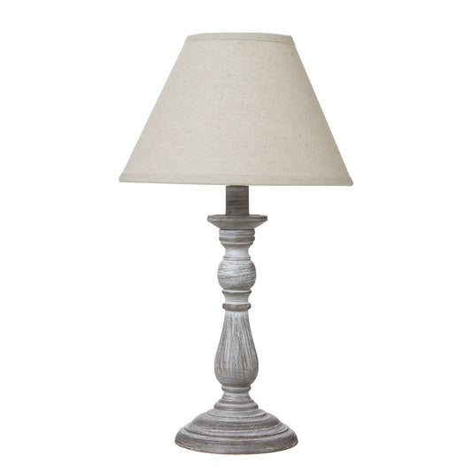 Column-style table lamp with a textured gray base and a soft beige linen shade, providing warm, inviting light for any decor.