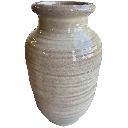 Tall, fluted vase in soft neutral tones with vertical ridges, adding elegance and height to any decor.