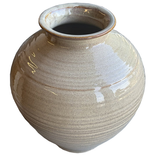 Sculptural brindled vase in red, featuring an intricate play of light and shadow, ideal for modern or classic interiors.