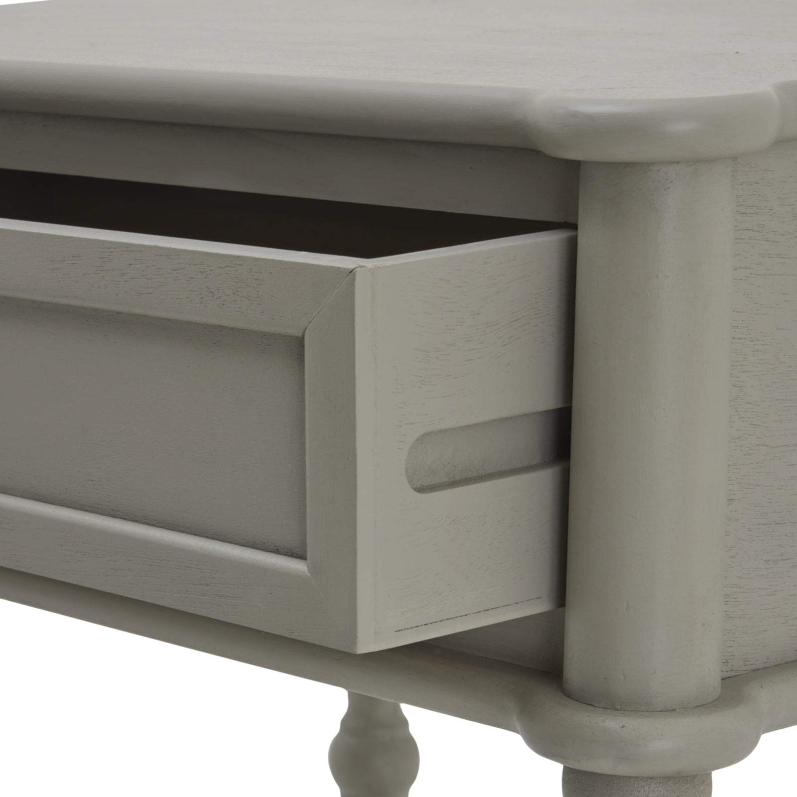 Light gray side table with a single drawer, showcasing rounded edges and elegant craftsmanship for a minimalist home decor.