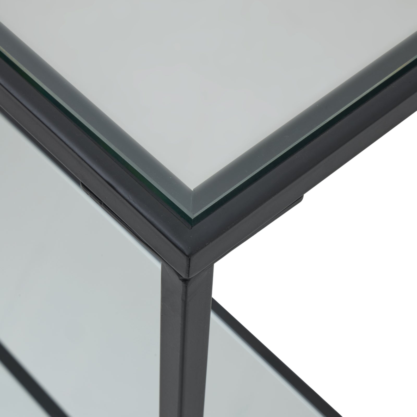 Sleek black-framed console table with a modern, minimalist design and glass top, perfect for adding sophistication to any room.