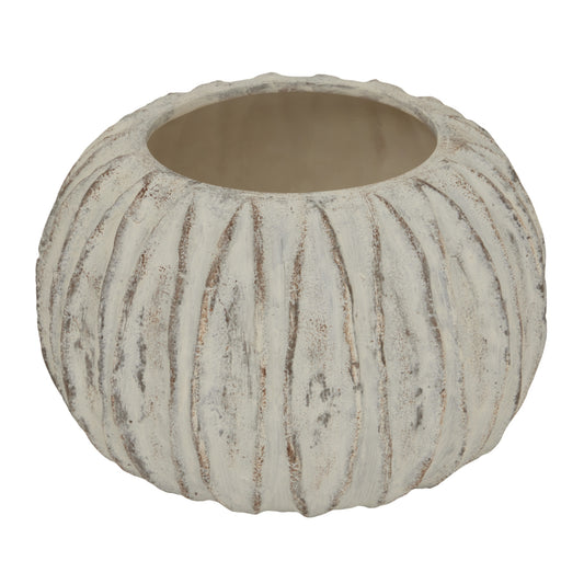 Stylish white vase with sculpted fin texture and rhythmic vertical lines, adding elegance to contemporary decor.
