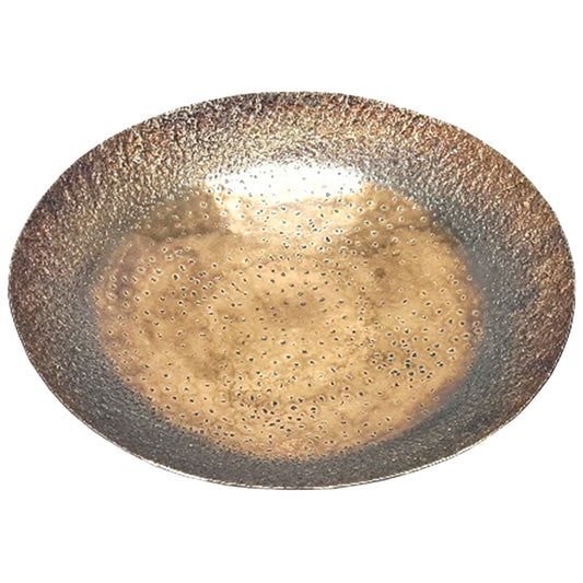 Textured metallic wall plate featuring layered circular patterns in gold and bronze, creating a modern minimalist focal point.