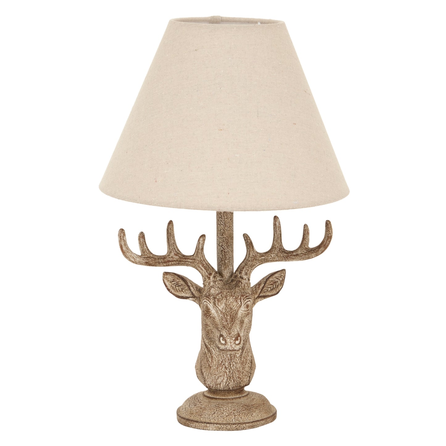 Stonewashed table lamp featuring a detailed stag head base in natural tones, topped with a cream linen shade for rustic elegance.