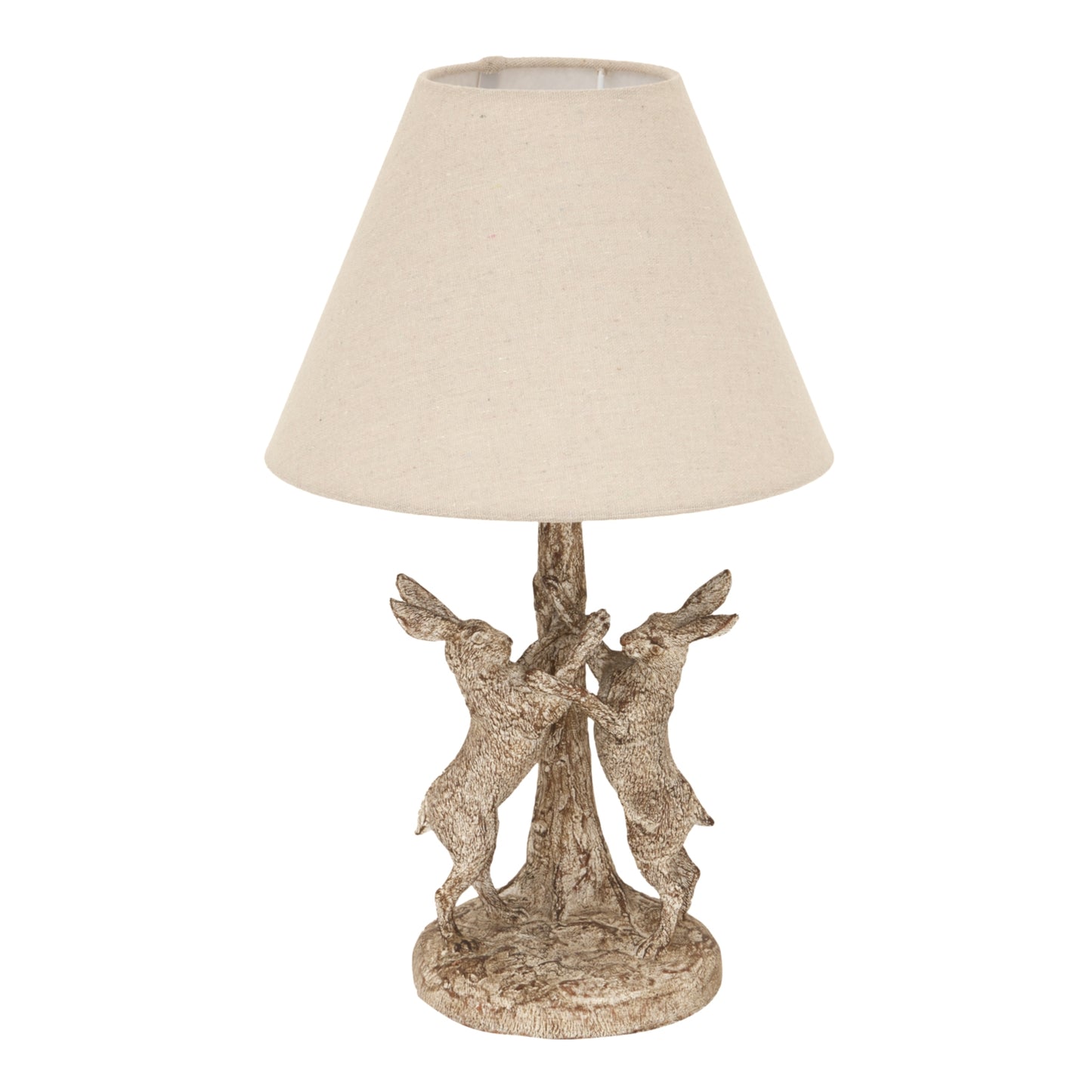 Stonewashed table lamp featuring two intricately designed marching hares, topped with a natural linen shade for soft lighting.