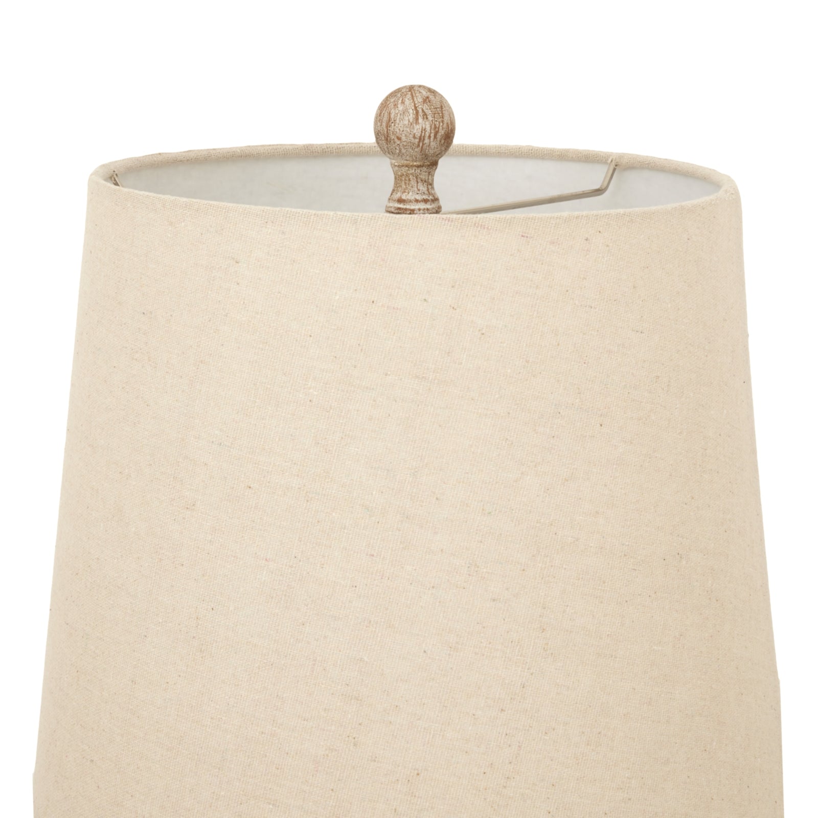 Red candlestick table lamp featuring a neutral linen shade, exuding elegance and warmth for diverse home decor styles.