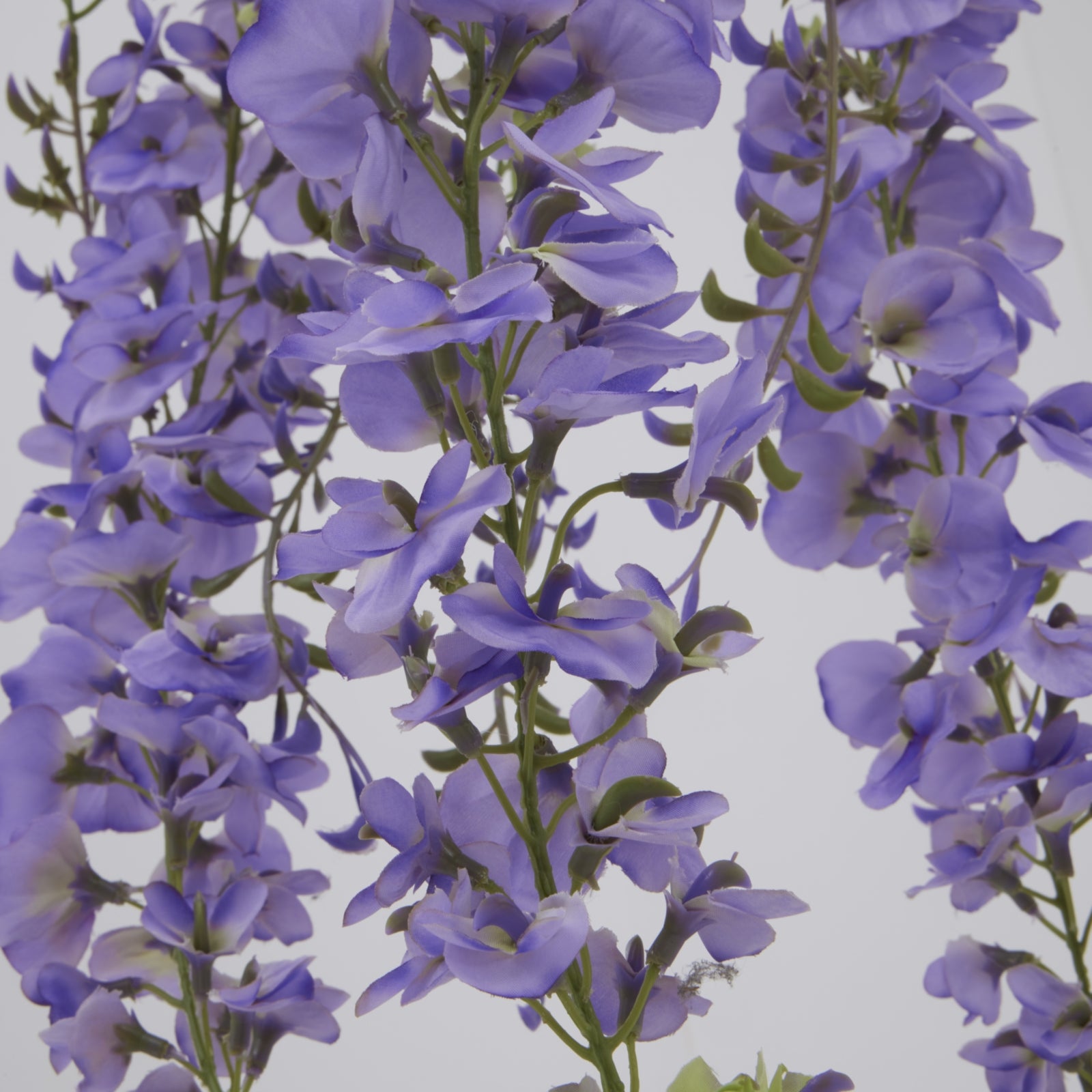Large purple wisteria spray with cascading blooms and green accents, measuring 180cm, for elegant floral arrangements.