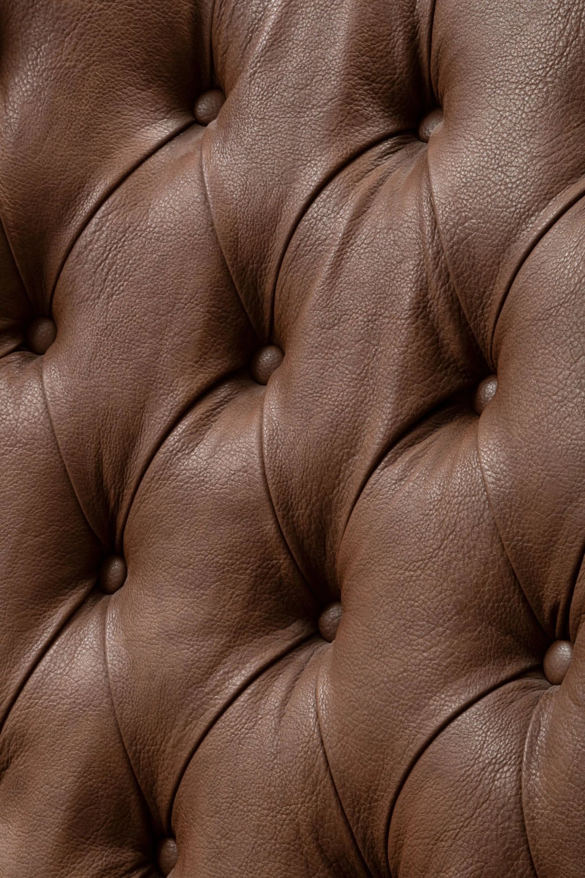 Ashbourne Brown Leather Effect Chair With Winged Back