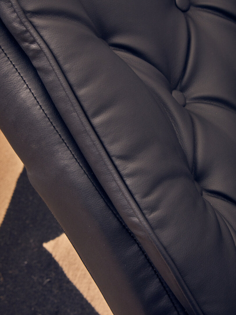 Cheshire Ivory Leather Effect Recliner And FootstoolWarrington Black Leather Effect Recliner And Footstool