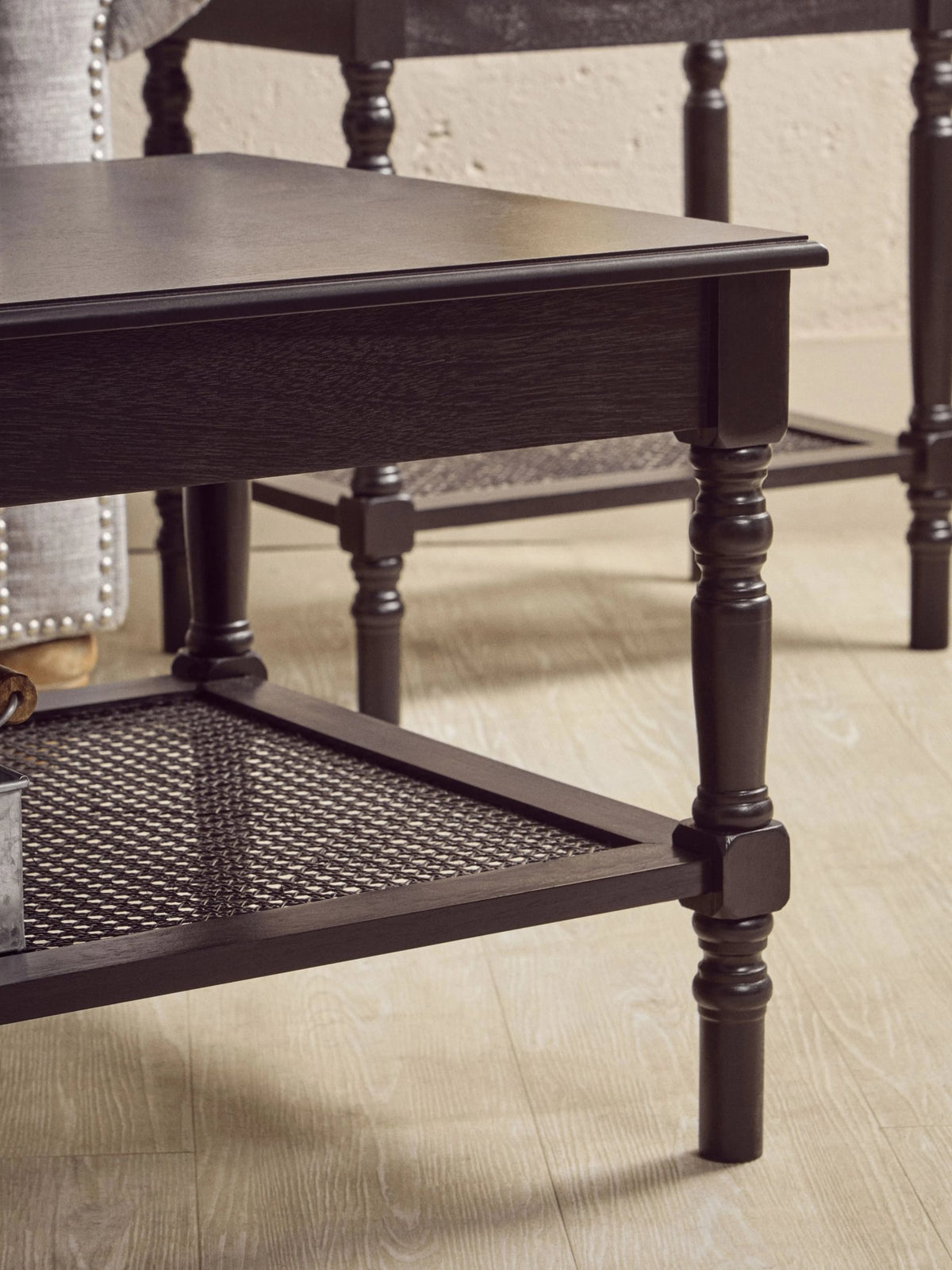 Heirloom Black Wooden Coffee Table with Rattan Shelf