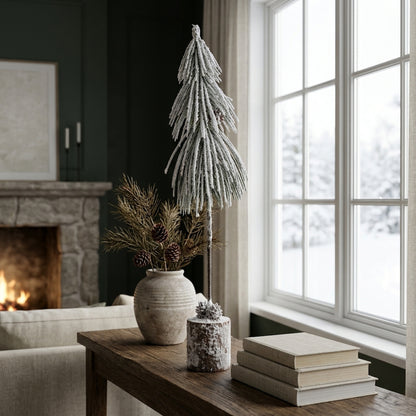 Small Snowy Tree In Wood Log